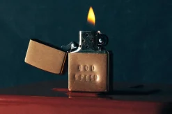 Women Imogene + Willie hand stamped “godspeed” zippo