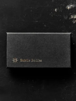 Women Imogene + Willie subtle bodies brass incense holder