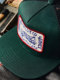 Women Imogene + Willie the "tow service" trucker