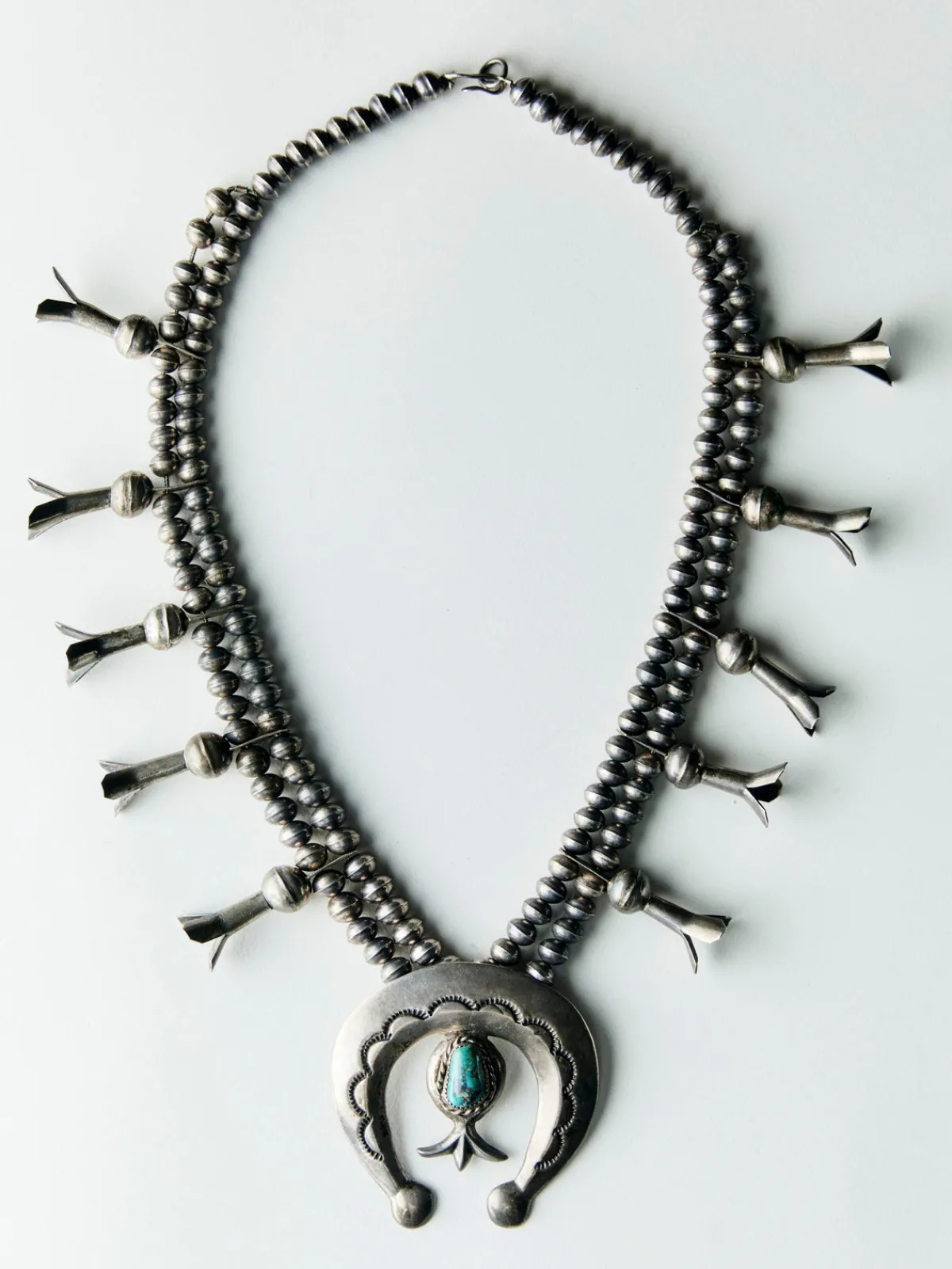 Women Imogene + Willie vintage navajo silver squash blossom